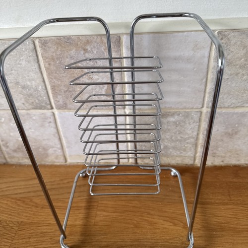 Metal rack holds 10 cds - holds,