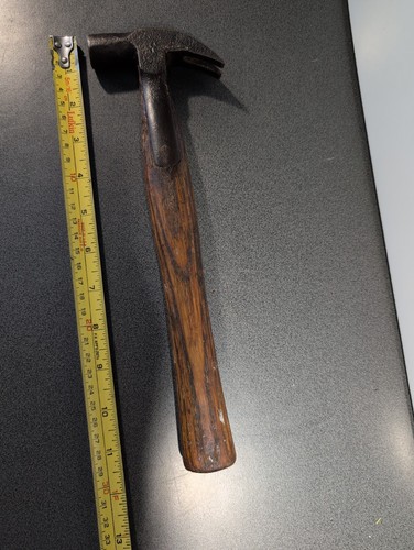 Vintage strapped claw hammer