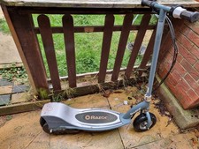 Razor E300 electric scooter with charger read below