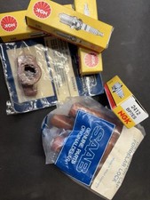 Saab 99 turbo 900 Classic turbo. Genuine Dizzy Cap, Rotor Arm And 4 Plugs NOS