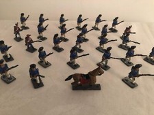 A collection of old vintage hand painted metal soldiers & a horse / 28 items