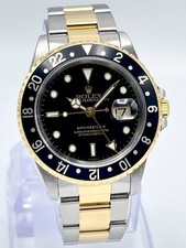Rolex GMT-Master II 16713 40mm Two Tone Bi Metal Yellow Gold Black Dial Papers
