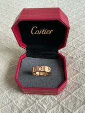 In the style of Cartier Love Ring
