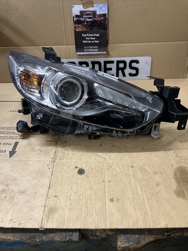 Mazda front headlight - front,