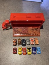 Disney Cars Diecast Min Mack Carrier & 12 Mini Racers