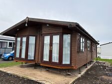 Cosalt log cabin 35x20 2 bed fully winterised gas central heating free transport