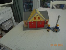 Fire Station with a Fireman's Pole and with Fireman Sam & Elvis Figures.