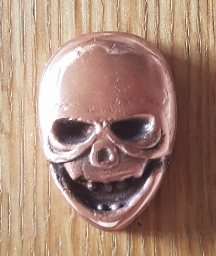 Copper hand poured skull 999 - hand,