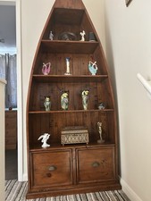 TALL BOAT SHAPED SHELVES/ CABINET