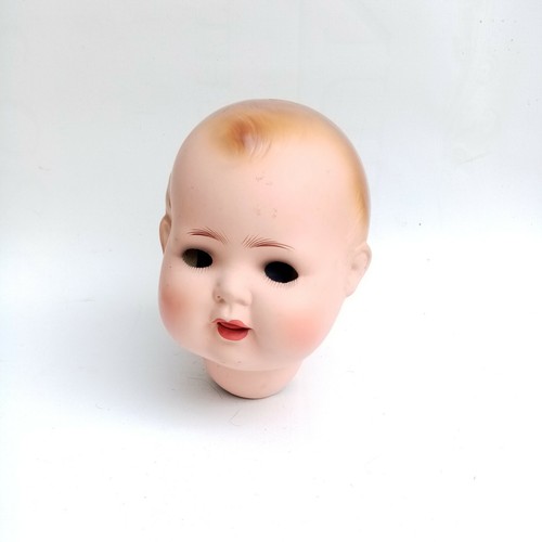 Antique composition doll head