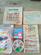 A selection of mint condition vintage fishing spinners.