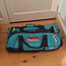 "MAKITA" DUFFELL TOOL BAG + WHEELS. UNUSED.