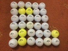32 Slazenger golf balls ok condition.