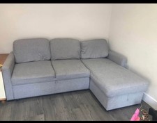 L shaped grey sofa bed with storage - used