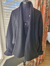 Joyce Ridings, black cardigan