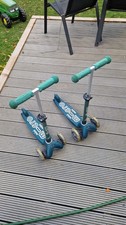 Two Mini Micro Deluxe Eco Scooters 