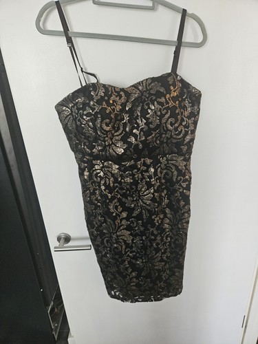 Next black and gold - next,