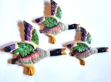 Flying ducks plaster wall