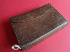 AN ANTIQUE VICTORIAN LEATHER BOUND FLY FISHING WALLET (AS FOUND CONDITION)