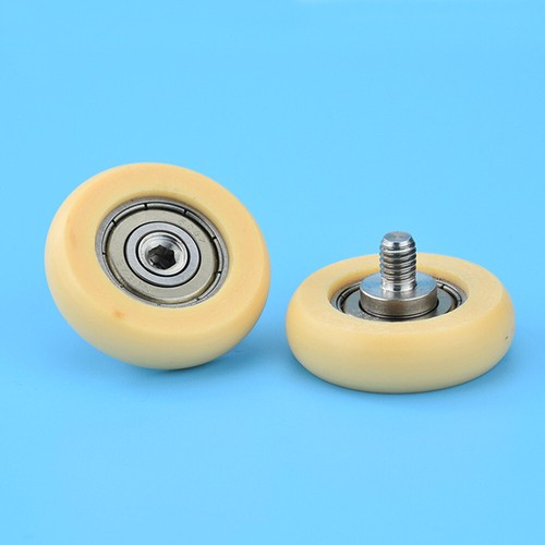 Rowing machine seat wheel