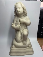 VINTAGE PARIAN FIGURE OF A CHILD WITH BIBLE  KNEELING ON A CUSHION.  16.5 CM