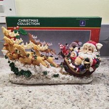 Vintage Santa in Sleigh with  Reindeers Resin Ornament Boxed 11" in length