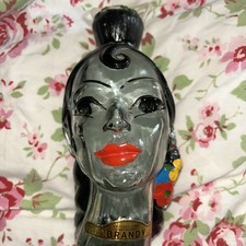 Vintage Spanish Lady Empty Brandy Bottle.