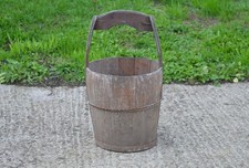 old vintage wooden rice bucket