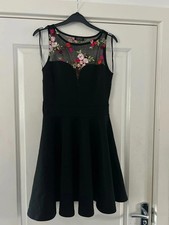 Evita Size 10 Floral Black