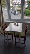 Mid Century formica dining table and two chairs