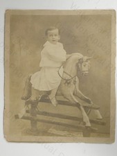 Young Boy Rocking Horse Toy