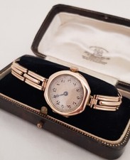 9ct Gold wrist watch & bracelet. London 1920. By Rolex . Art Deco period 