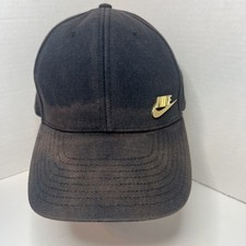 Black Nike Golden Swoosh