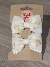 Handmade Cream Grosgrain And Voile Floral Ribbon Hair Clips measuring 6x3 cm