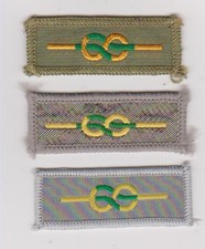 UK Boy Scouts three varieties SILVER WOLF cloth uniform knot badges