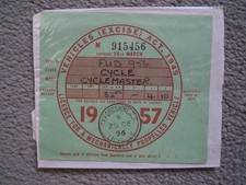 Tax Disc For Cyclemaster Cycle December 1957 with surrounding paper