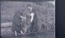 GLASS NEGATIVE LADY &GENT WITH BIKES BICYCLES c1920s  3" x 4" SOCIAL HISTORY