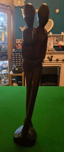 Hand carved man - &, woman