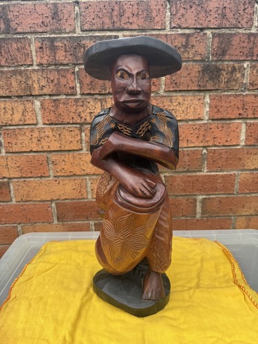Man with drum - , carved