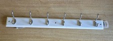 HOMEBASE 6 HOOK COAT RACK ON WHITE PAINTED BOARD
