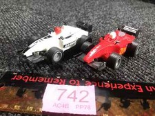 Pair of F1 1:43 Scale Slot