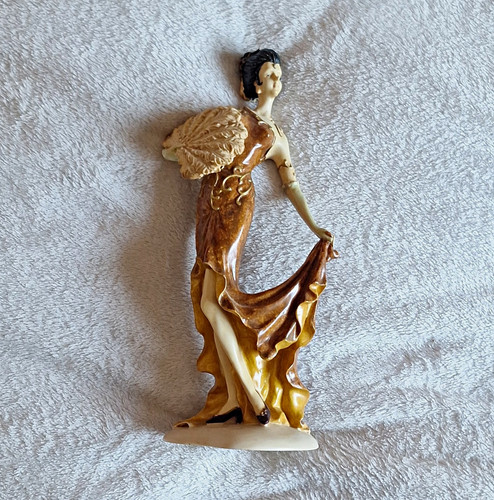 Gold tone angel figurine ivory - tone,