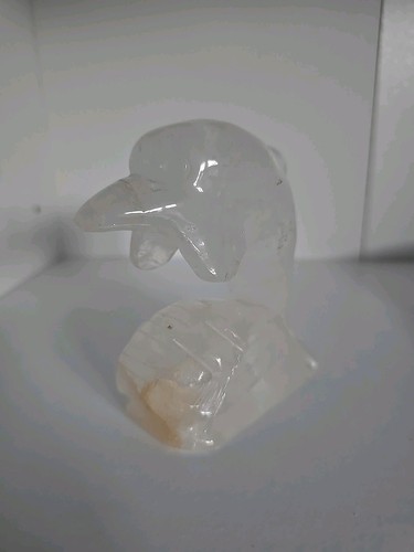 Clear quart dolphin carving - quart,
