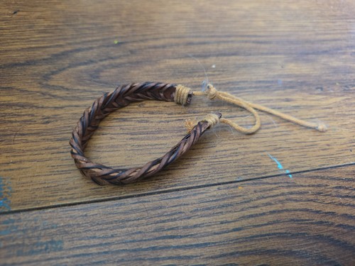 Light and dark brown braided - and,