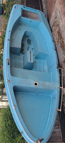 Skipper sailing dinghy with - sailing,