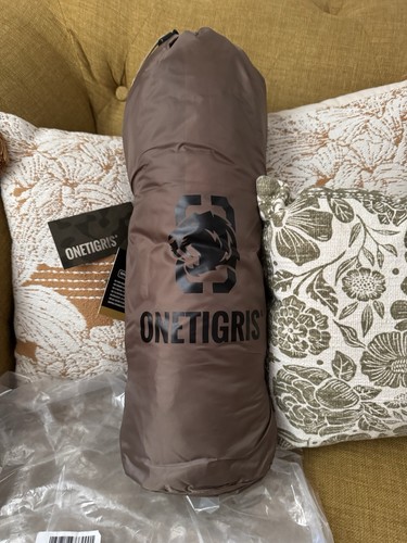 One tigris tan gram - 2, person