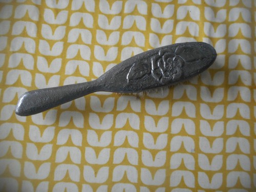Vintage clothes brush