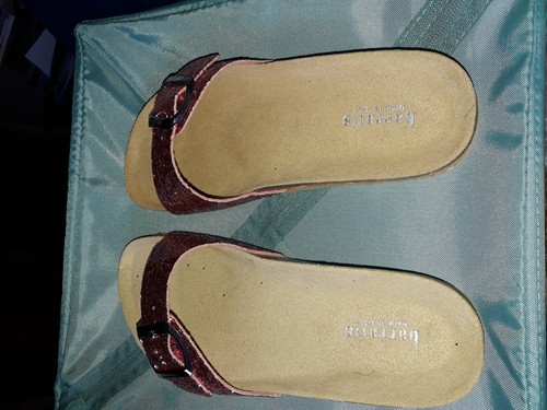 Pink glitter flip flops