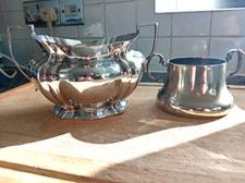 2 vintage silver plated sugar bowls - 1 very ornate - with twin handles.