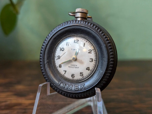 1955 timex tyre key ring - c.1955,